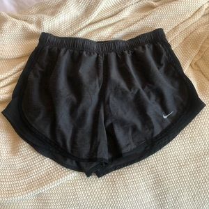 Black Nike running shorts